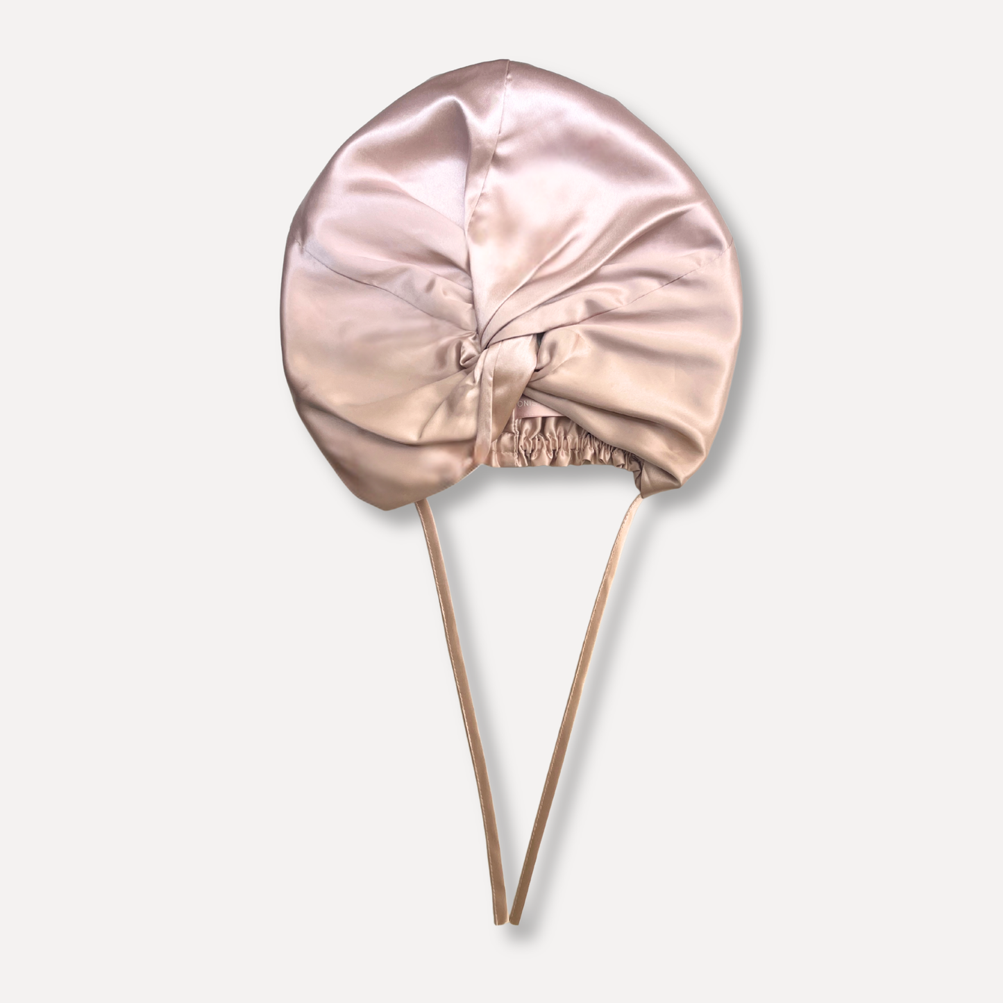 turbante de seda rosa de Onisa Coté